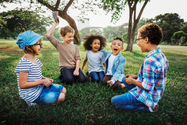 Happy kids in the park, vivid tone